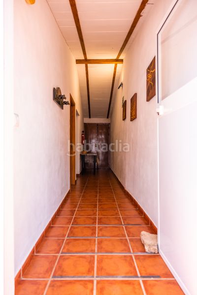 Foto ee3aded4-8723-49fb-bf5d-064c62272bc2. Masia amb xemeneia aparcament piscina a Montejaque