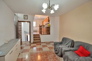 Casa adossada  Calle clavel. Dos viviendas con garaje