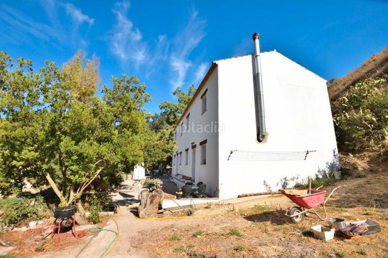 Foto dbd6caf1-7eac-47a0-83a6-00d1aa215c43. Masia amb aparcament a Arriate