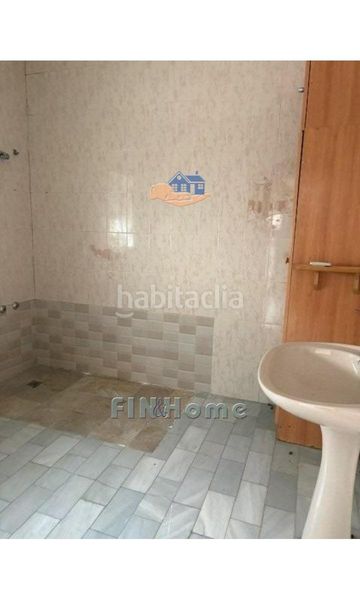 Foto 16014aa6-4b9e-47e6-abea-aef5dd1b3d2e. Casa adossada a Umbrete