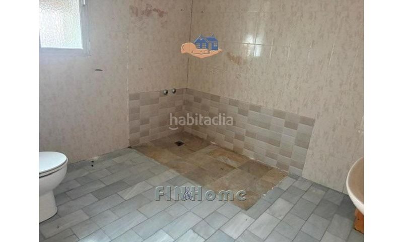 Foto 8b54e1a9-efdb-4ac0-b9a5-4d411caf96e3. Casa adossada a Umbrete