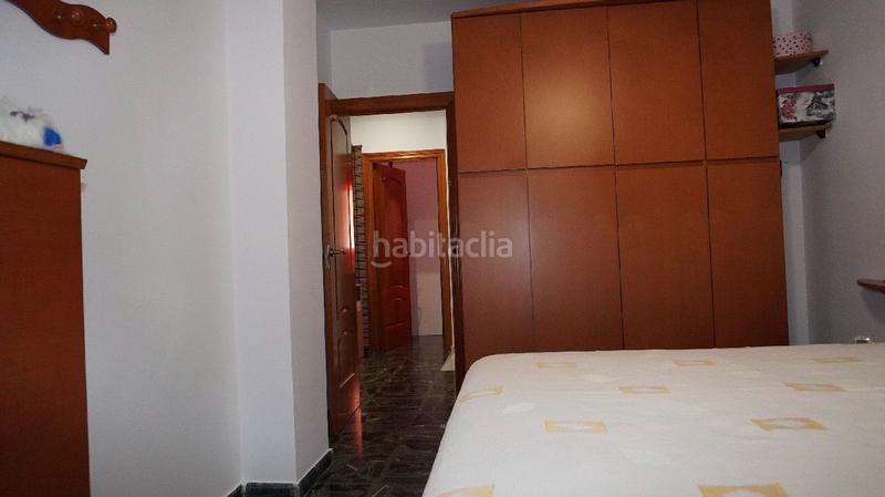 Foto 97add75b-97e6-4d74-9bbe-ec9787e59f32. Casa adosada amplia casa agrupada de 198 m2 en calle amadeo nervo en Motril