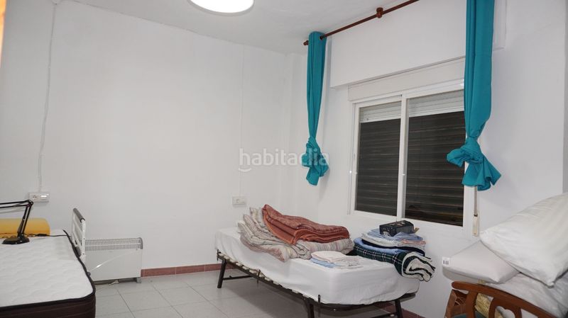 Foto ae4fba91-86cc-4e87-8a9b-35ece7f2735a. Casa adossada a Motril ciudad Motril