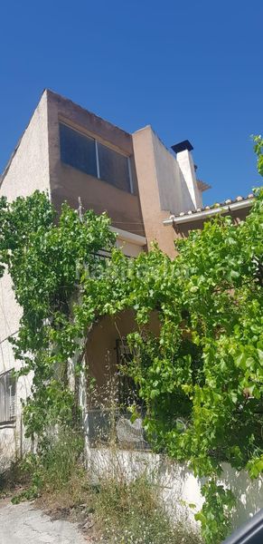Foto c24a1a59-5568-4d6b-ad37-673fd9504aad. Casa amb aparcament a Alcóntar