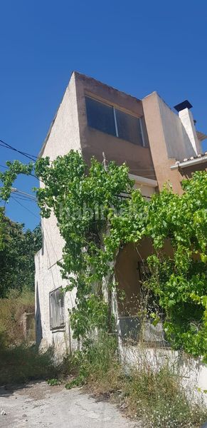 Foto fe06e6a6-1ecd-487c-962c-495221710fbd. Casa amb aparcament a Alcóntar