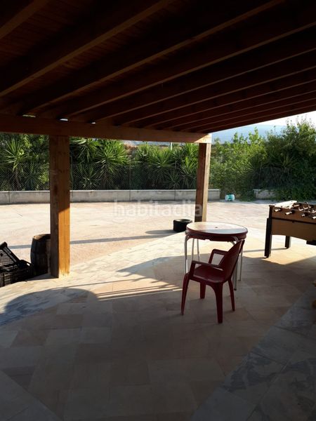 Foto f66501c9-1ec4-4001-ab34-3ba5f639bb6a. Country house with parking in Urrácal