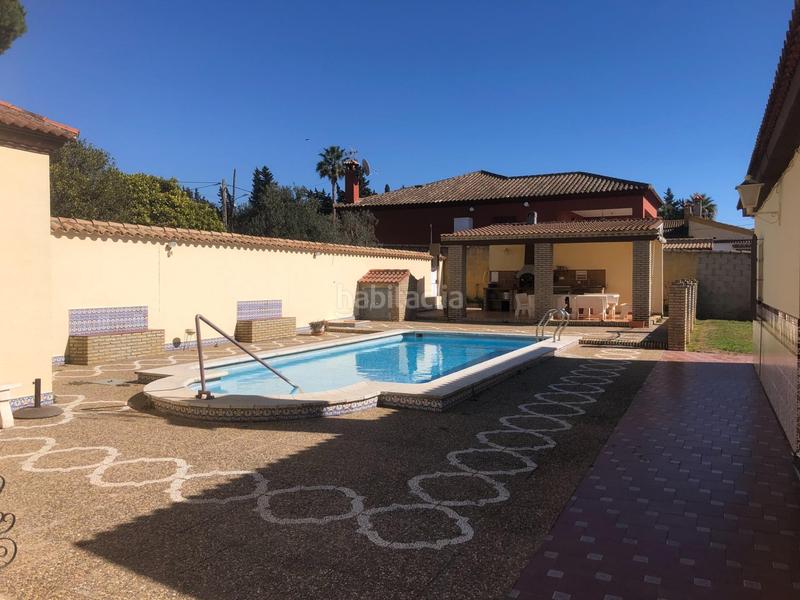 Foto 9157e364-0aa0-415f-b9f1-30626b41f3d5. Chalet  con 2 viviendas, piscina y amplio garaje cerrado en Chiclana de la Frontera