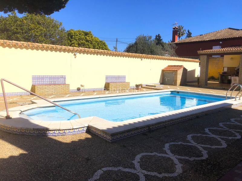 Foto e63154dc-2609-4663-8697-c444119fef6b. Chalet  con 2 viviendas, piscina y amplio garaje cerrado en Chiclana de la Frontera