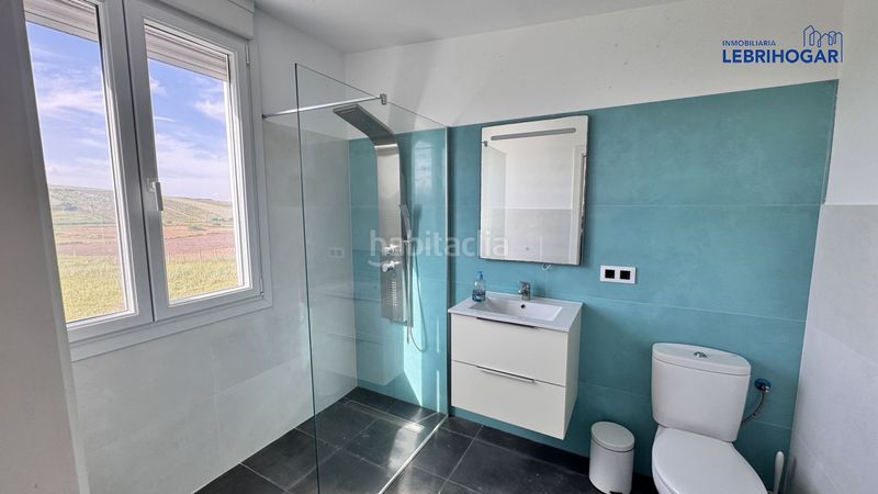 Foto 0cdcf209-8358-4f03-9f62-8c371592f570. Casa adossada amb calefacció aparcament a Lebrija