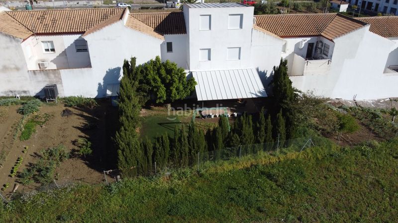 Foto fa5b240d-ea0d-4e70-be4c-1dbf509c8f7d. Casa adossada amb calefacció aparcament a Lebrija