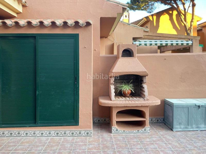 Foto e385cd9f-79b2-4d28-9cd2-7eea673e821c. Casa adossada amb piscina a La Barrosa Chiclana de la Frontera