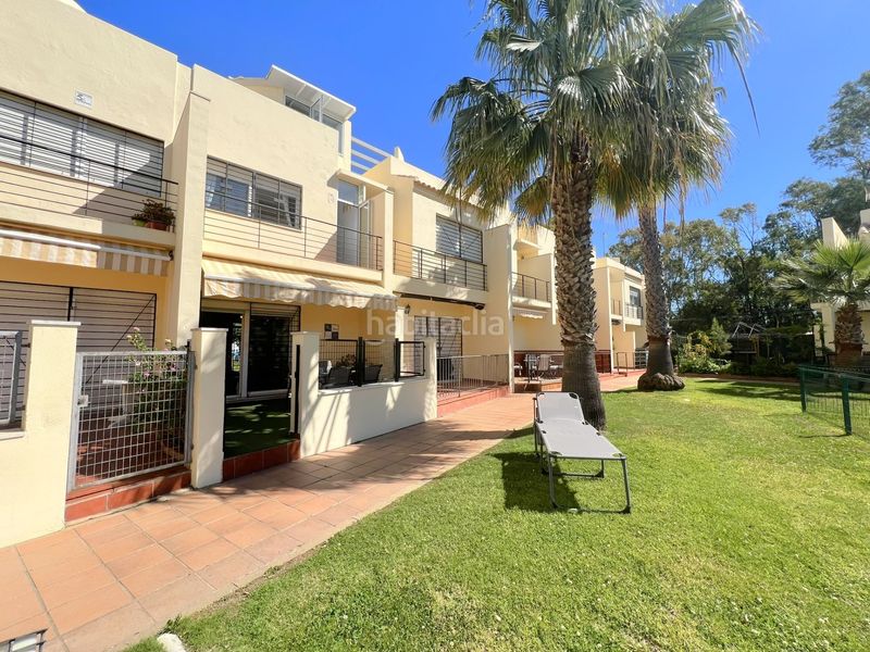 Foto 0366df40-6f53-451b-ba66-94b2088cc0d5. Casa adosada adosado en urbanización privada con terraza y piscina, a 200 metros de playa central en Isla Cristina