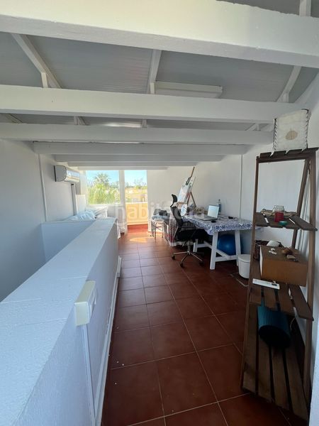 Foto 04374fa4-6b35-4e41-b36d-aa4237af2099. Casa adosada adosado en urbanización privada con terraza y piscina, a 200 metros de playa central en Isla Cristina