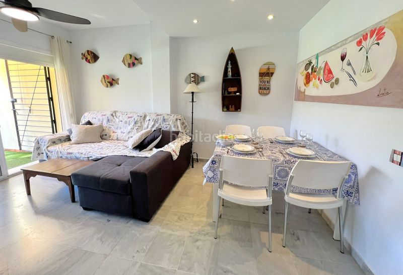 Foto 43cfea94-9bcc-4f58-910b-a8bfac9c5e0b. Casa adosada adosado en urbanización privada con terraza y piscina, a 200 metros de playa central en Isla Cristina