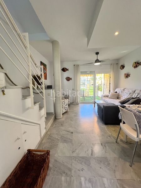 Foto 4e72a654-3338-4900-9ef9-875d0abc64eb. Casa adosada adosado en urbanización privada con terraza y piscina, a 200 metros de playa central en Isla Cristina