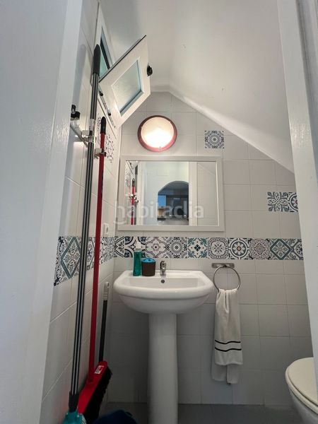 Foto 65dac520-9045-4ee6-8bb3-d6f9e18fe6c0. Casa adosada adosado en urbanización privada con terraza y piscina, a 200 metros de playa central en Isla Cristina