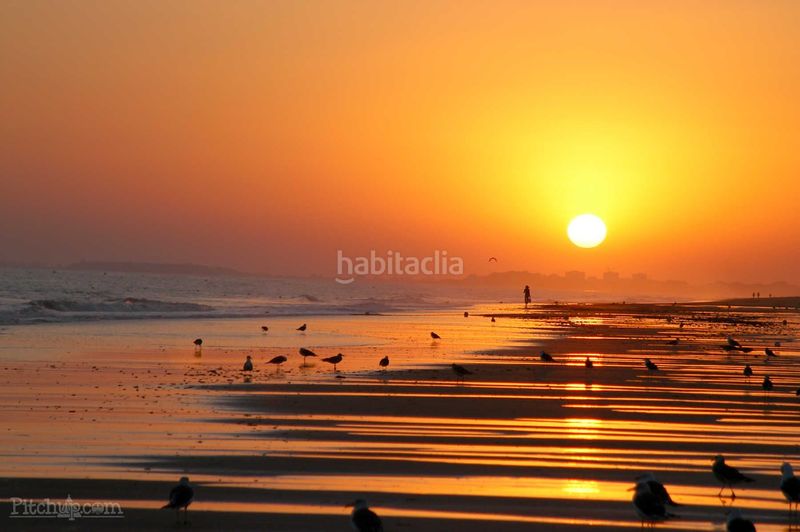 Foto 79acd824-758b-42a6-b643-bba9c54ca2cd. Casa adosada adosado en urbanización privada con terraza y piscina, a 200 metros de playa central en Isla Cristina