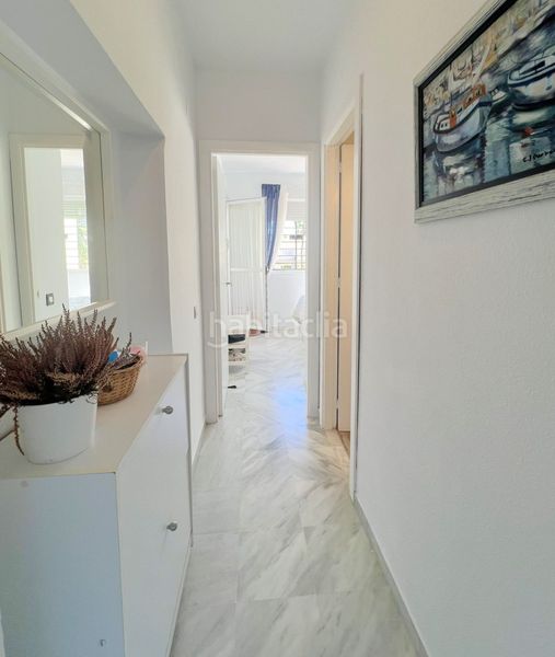 Foto 92041b9c-ef6a-48eb-b8a2-eb1a573206b5. Casa adosada adosado en urbanización privada con terraza y piscina, a 200 metros de playa central en Isla Cristina