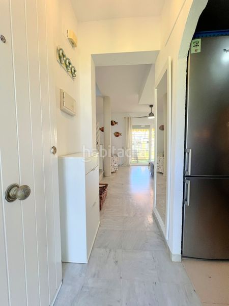 Foto 9efecc09-ba42-4da5-8d5d-540368cc170b. Casa adosada adosado en urbanización privada con terraza y piscina, a 200 metros de playa central en Isla Cristina