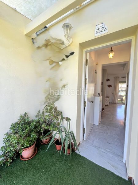 Foto c3ea18c0-1f76-457e-a9f8-9e0754b400d9. Casa adosada adosado en urbanización privada con terraza y piscina, a 200 metros de playa central en Isla Cristina