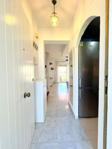 Foto c51cf962-9479-42f8-be80-1f6a92f1bdaa. Casa adosada adosado en urbanización privada con terraza y piscina, a 200 metros de playa central en Isla Cristina