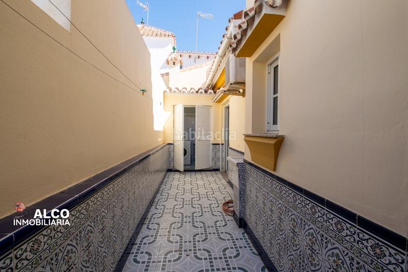 Foto a64067ec-1221-4ea8-954d-ff4d1cc94e93. Chalet mit parking in Urbanización Santa Rosa Torrox