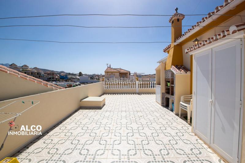 Foto f260357b-2536-4556-8f43-b77ae8133607. Chalet mit parking in Urbanización Santa Rosa Torrox