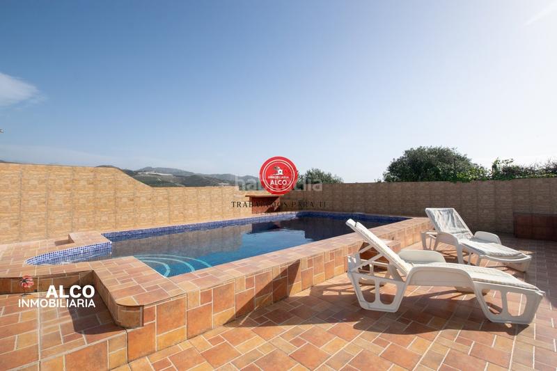 Foto 7b7d1a7c-e0a2-4fa9-9bc1-d9b5e7696fc3. Chalet  vélez málaga características generales superficie total 5740 m terraza cocina completa dormitorios 3 baños 1 zo en Lagos