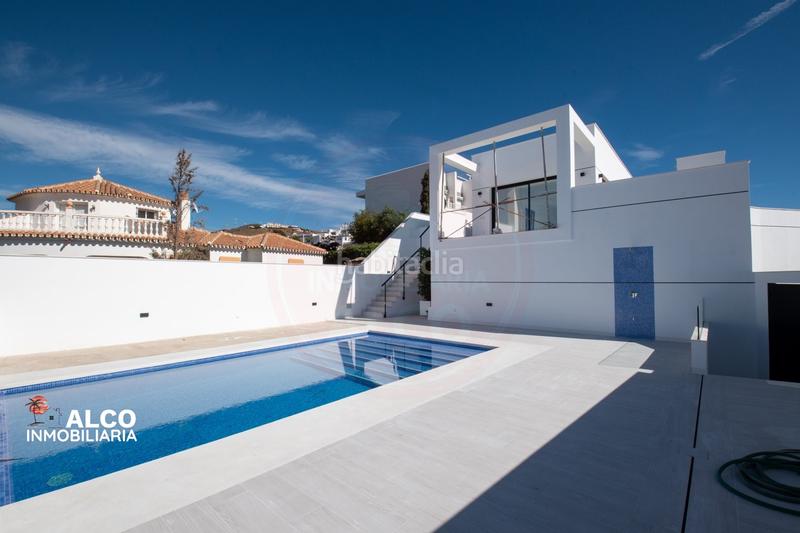 Foto 057dbc8d-65de-4bf0-9583-6205d77860fb. Chalet avec parking piscine dans Torrox park Torrox