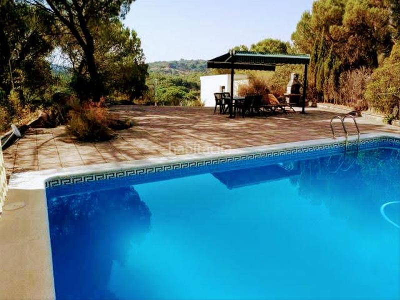 Foto 2b09b5b5-5761-4907-bfbc-96bb5570fbf4. Casa aparellada amb xemeneia calefacció aparcament piscina a Córdoba