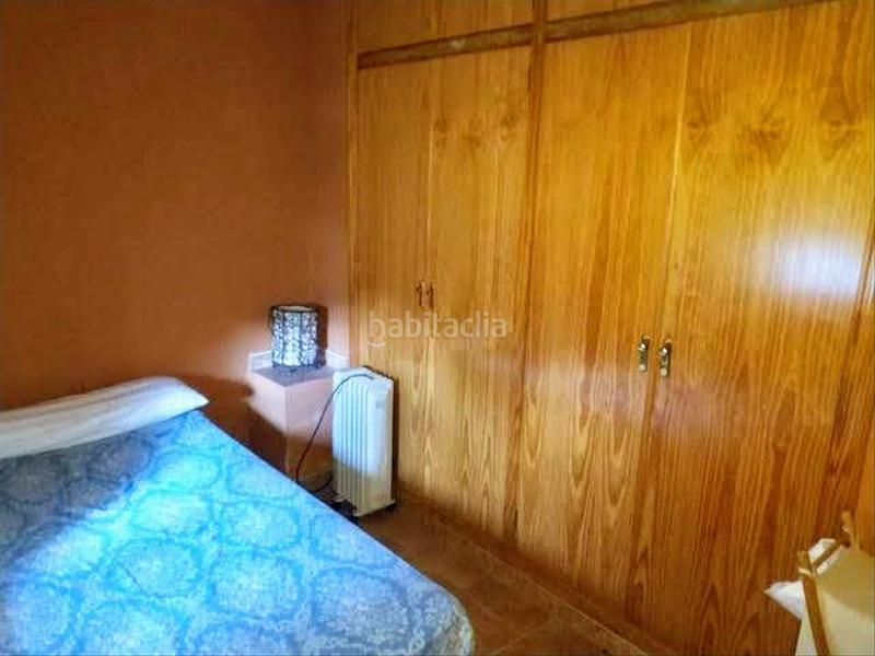 Foto c3d6efaf-bd67-4a4e-922f-2eef05e160a1. Casa aparellada amb xemeneia calefacció aparcament piscina a Córdoba