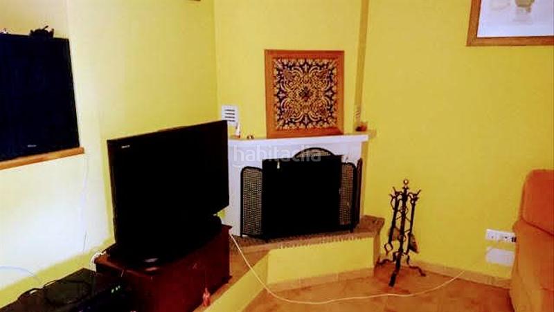 Foto c7fe3923-1368-45ac-838a-0ae721dd9a42. Casa aparellada amb xemeneia calefacció aparcament piscina a Córdoba