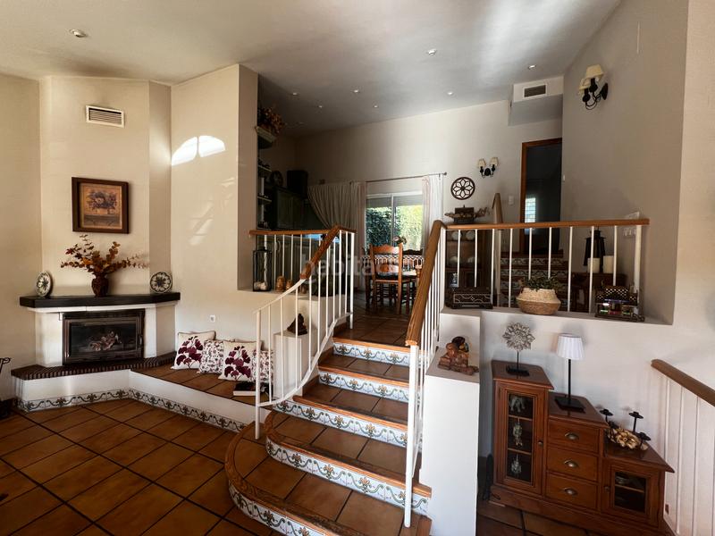 Foto 16ff41f8-3f10-4525-8bf6-65f34a5a8731. Casa aparellada amb xemeneia calefacció aparcament piscina a Córdoba