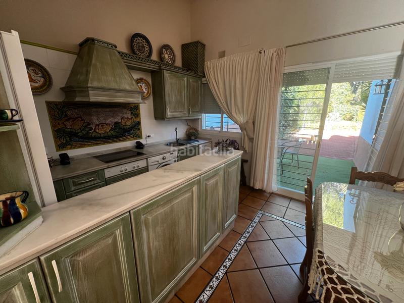 Foto 20c77233-d667-4e23-92e6-d3b96c96cef6. Casa aparellada amb xemeneia calefacció aparcament piscina a Córdoba