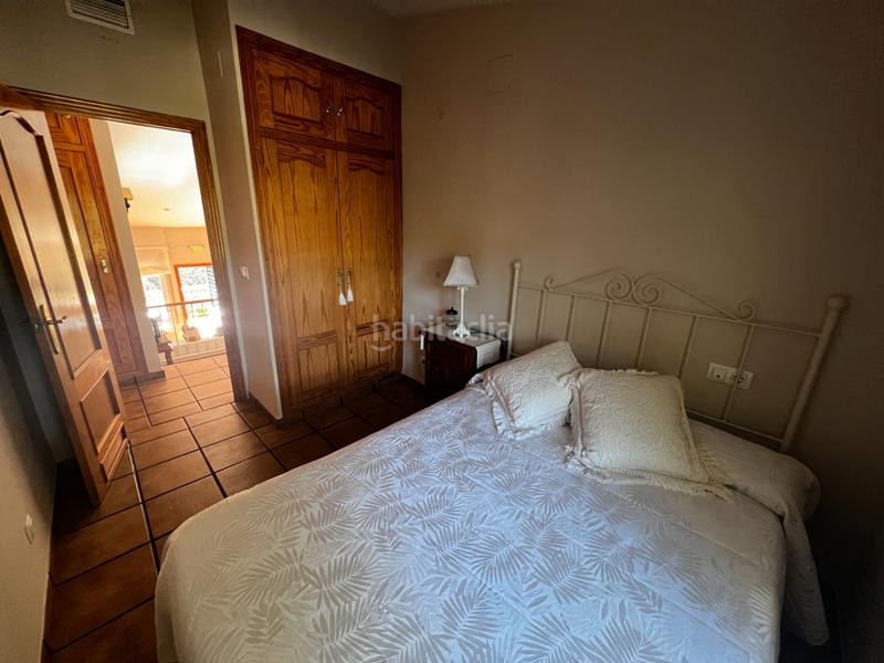 Foto 28102e52-35d4-4f06-9a51-967755c5a54c. Casa aparellada amb xemeneia calefacció aparcament piscina a Córdoba