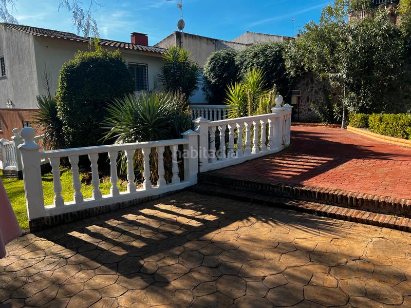 Foto 3f975a27-8bbc-4e50-a716-6954429ebdce. Casa aparellada amb xemeneia calefacció aparcament piscina a Córdoba