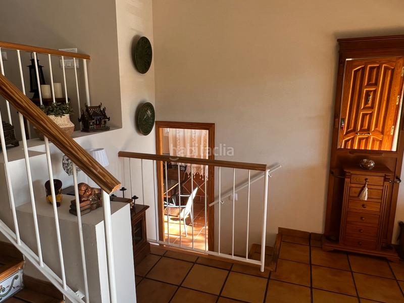 Foto 8e3271eb-89c3-4665-b4df-d32cdee3cd80. Casa aparellada amb xemeneia calefacció aparcament piscina a Córdoba