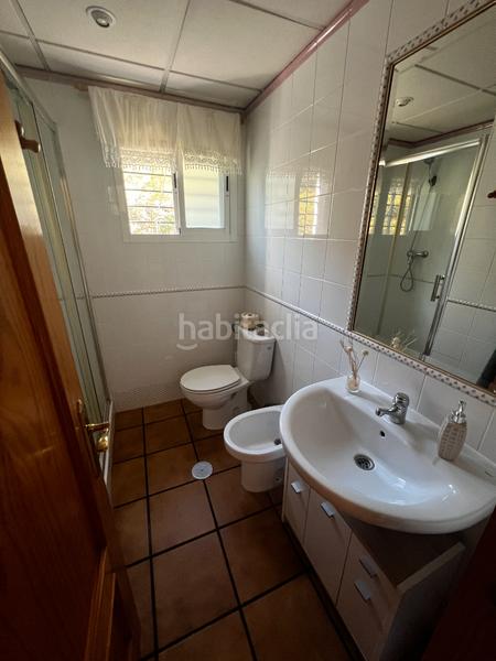 Foto c431bec9-09c7-4b25-b829-ae7fc2172823. Casa aparellada amb xemeneia calefacció aparcament piscina a Córdoba