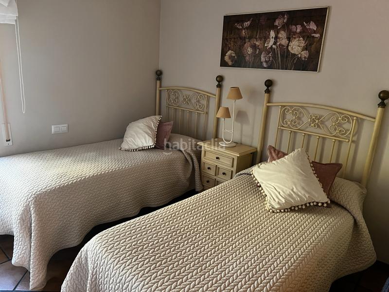 Foto df758666-8af1-4b6b-8f26-2039c21e8b21. Casa aparellada amb xemeneia calefacció aparcament piscina a Córdoba