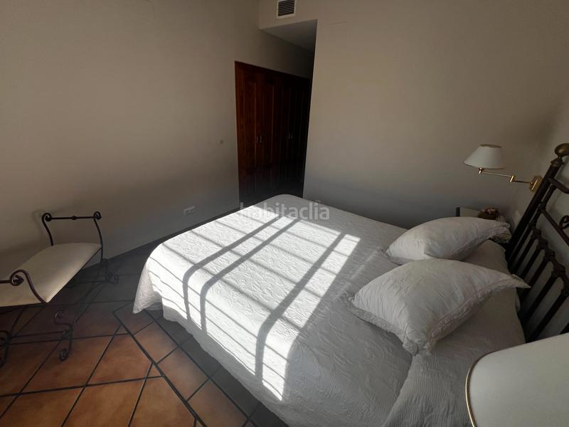 Foto efdc1d0a-1b58-4fd6-bc5f-f454f5064500. Casa aparellada amb xemeneia calefacció aparcament piscina a Córdoba