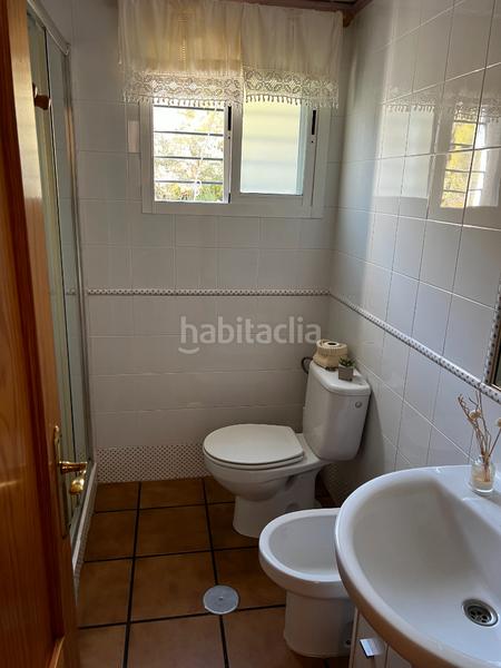 Foto fdcbf1ce-7e9c-4163-ab2b-35c8dc999ff0. Casa aparellada amb xemeneia calefacció aparcament piscina a Córdoba