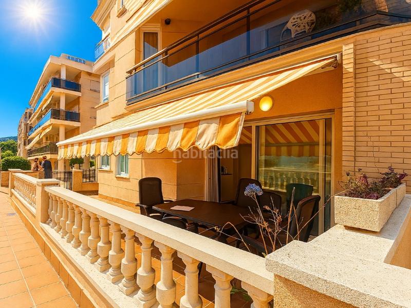 Foto 23897e82-9a0c-46d6-affa-b76aa4e06c20. Piso planta baja esquinera con terraza y piscina en mas mel, segunda linea de mar en Calafell