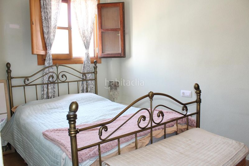 Foto c754d70f-43ba-406c-bf44-cdd4433d374e. Casa aparellada amb xemeneia calefacció a Enix