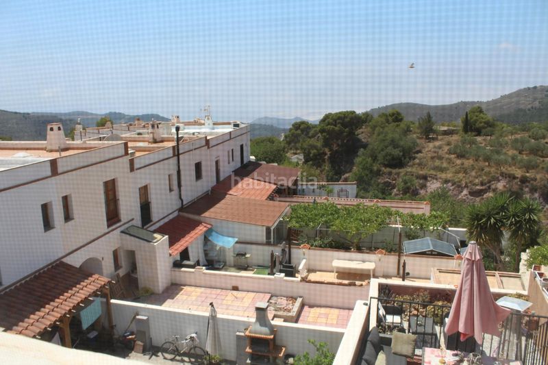 Foto fa5220b3-4ac0-402d-87d4-af96d0376ae7. Casa aparellada amb xemeneia calefacció a Enix