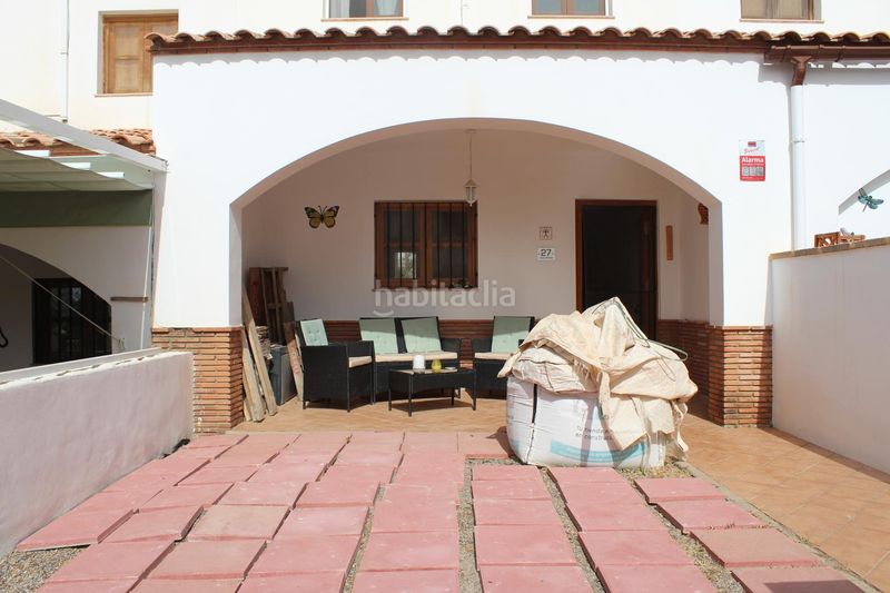 Foto 08311417-1f31-4e11-94a2-67189d8b61ff. Casa aparellada amb xemeneia aparcament a Enix