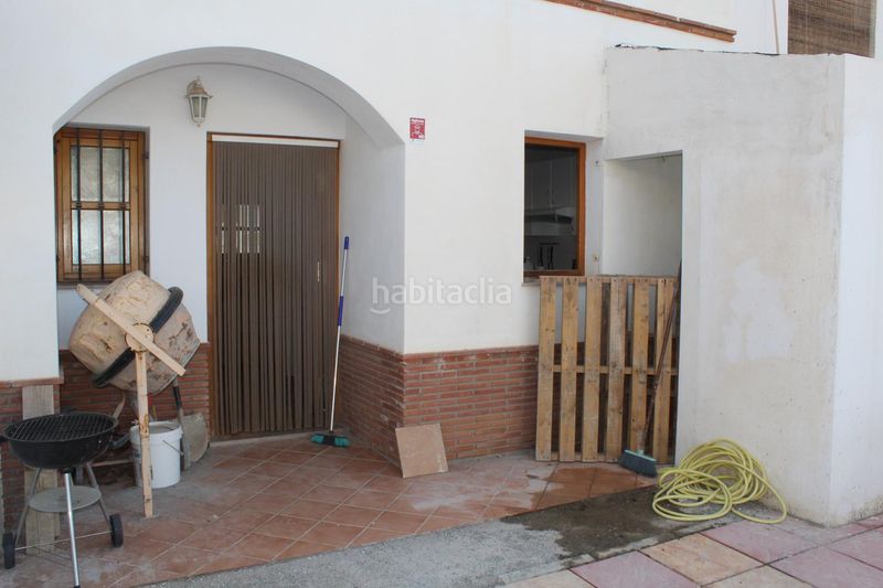 Foto 0d057912-b94f-4e63-b001-70386e8f1785. Casa aparellada amb xemeneia aparcament a Enix