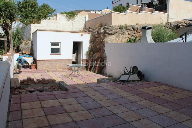 Foto 67e04cbf-822c-4ef6-bcf8-dd792884c3e3. Casa aparellada amb xemeneia aparcament a Enix