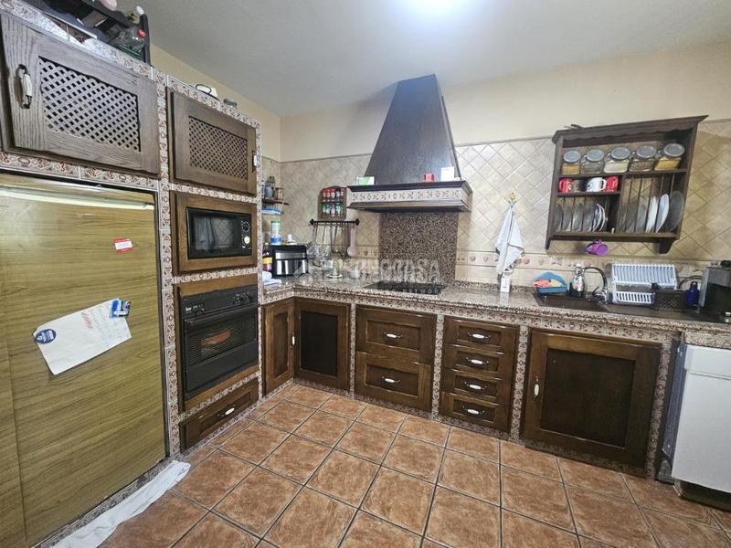 Foto d2cd5754-bd9d-4fbc-b9a4-0ef4747ec235. Maison jumelée dans Santa Eufemia Tomares