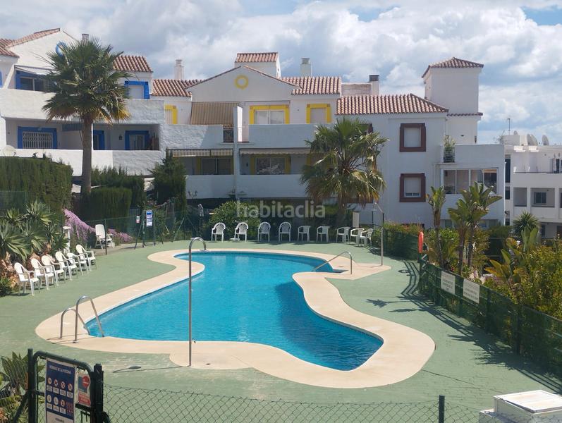Foto a2b4460a-4a96-4f72-a1d3-d733fe5d4a44. Piso bonito bajo con jardin privado en calahonda en Mijas