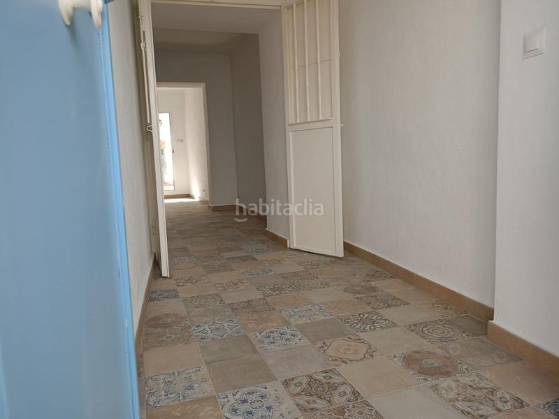 Foto 0f11495f-de25-4fa4-a6db-77680219c8ac. Casa adosada encantadora casa reformada 3 dormitorios, terraza y patio andaluz a 5 min del centro en Alozaina